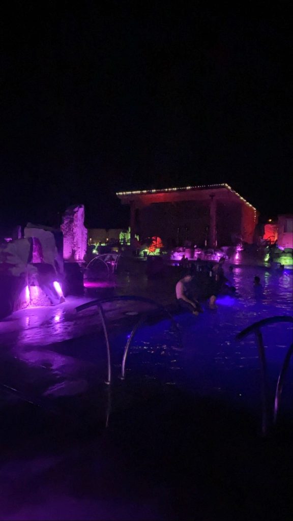 outdoor pools and stage after sundown at bozeman hot springs