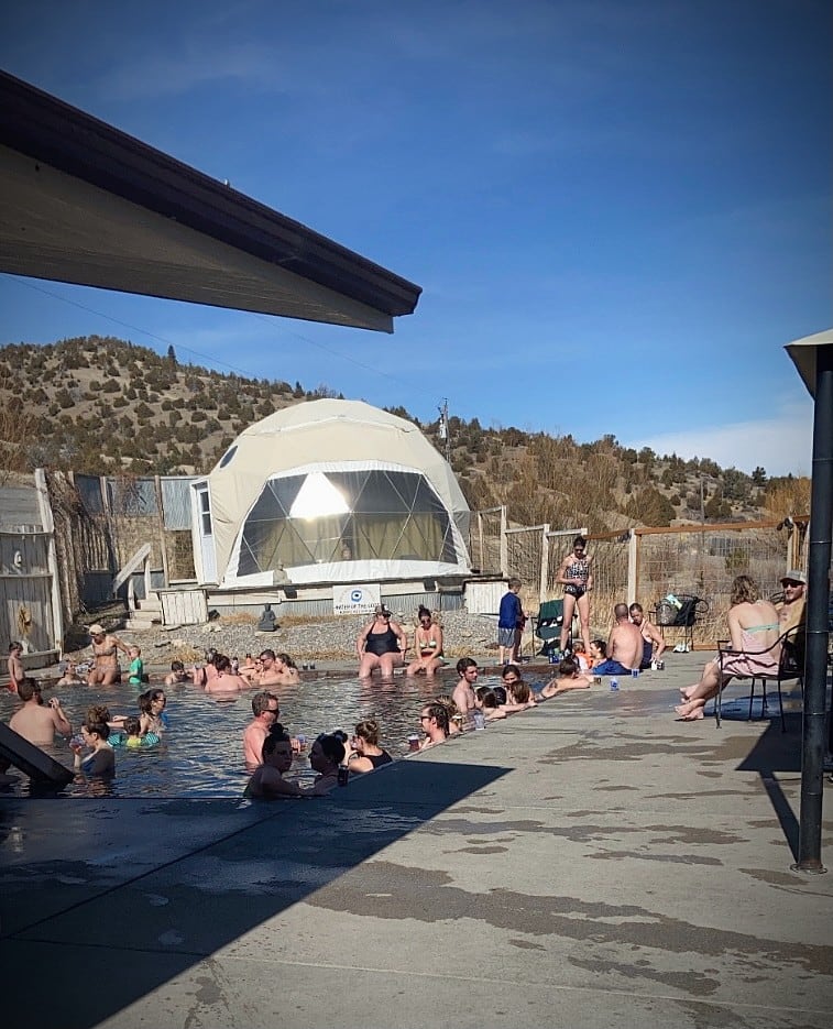 outdoor pool and covered stage at norris hot springs