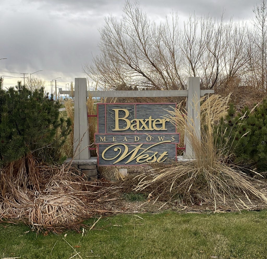 signage at the entrance to the baxter meadows west subdivision in bozeman