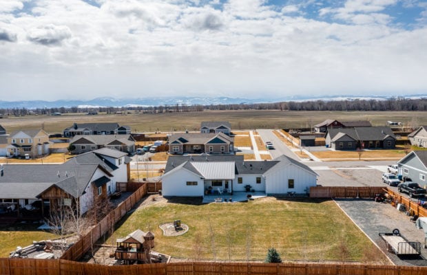 488 Countryside Lane - drone photo of fenced backyard and surrounding area