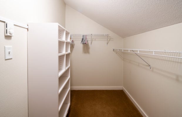 79 Starlight Drive - walk in closet to bedroom #3. walls are an off-white color.