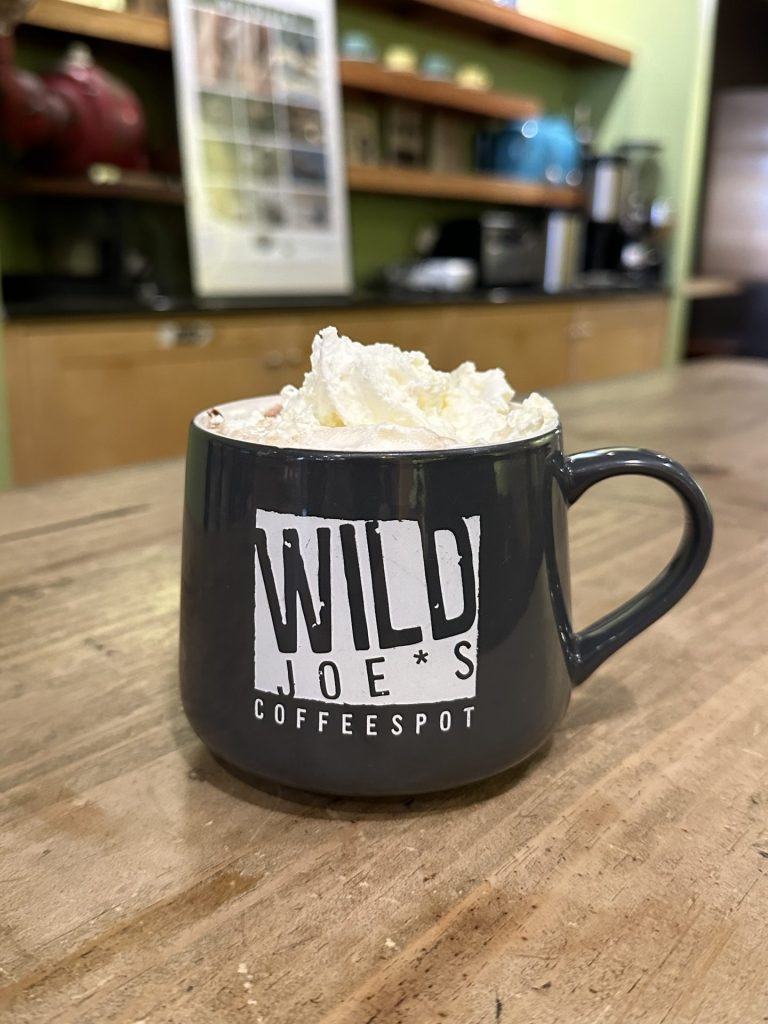 a dine-in mug of hot chocolate inside of wild joe's in downtown bozeman
