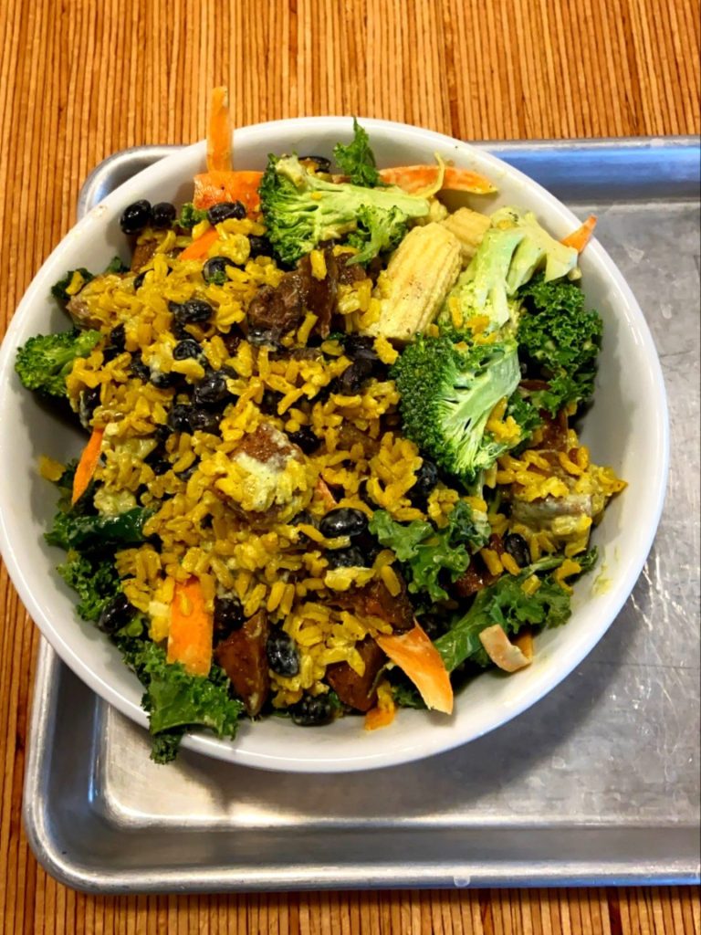 A bowl of vegan food inside of the farmacy restaurant