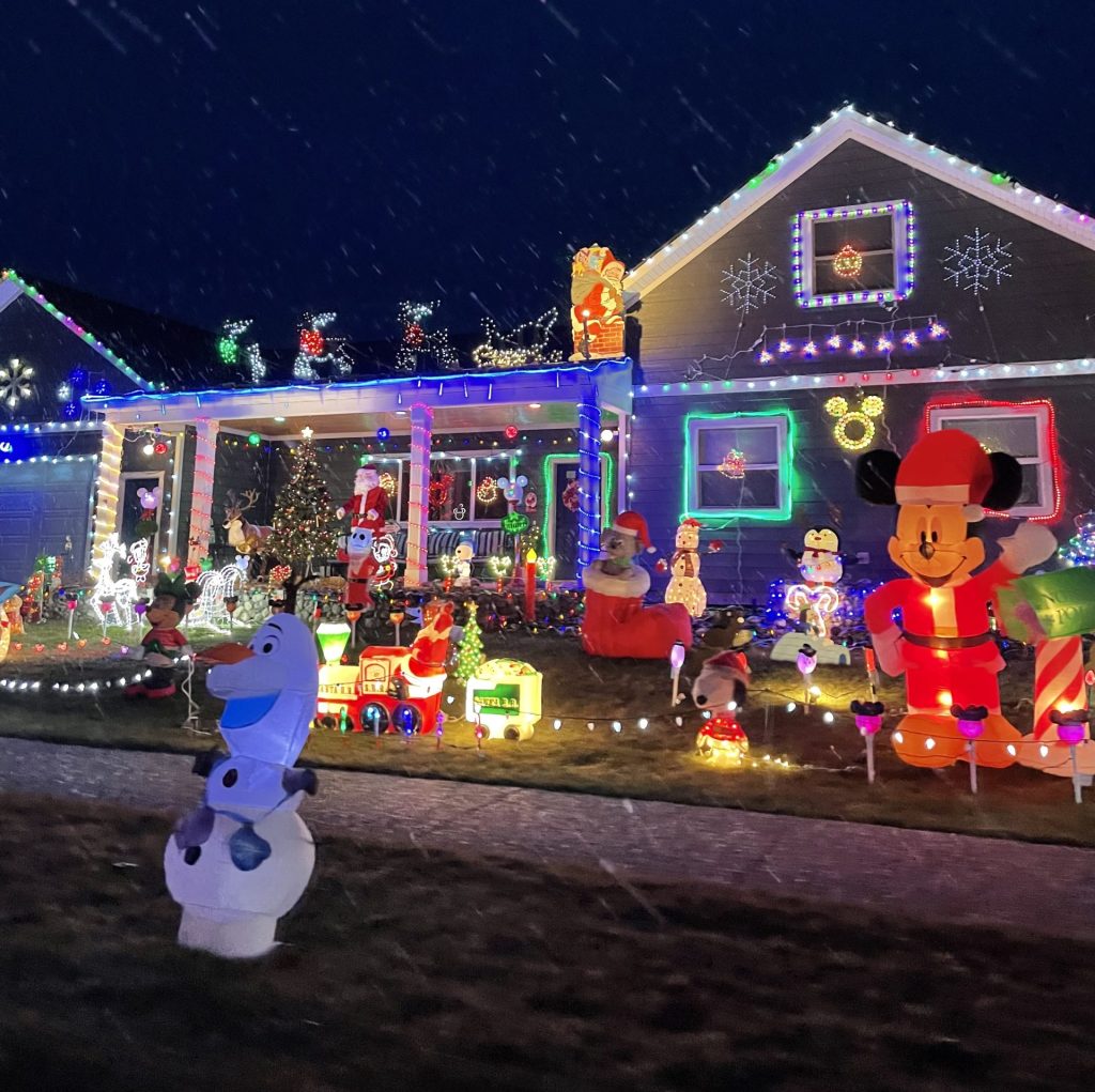 a home at 121 keystone drive in belgrade with a festive outdoor display for the holidays