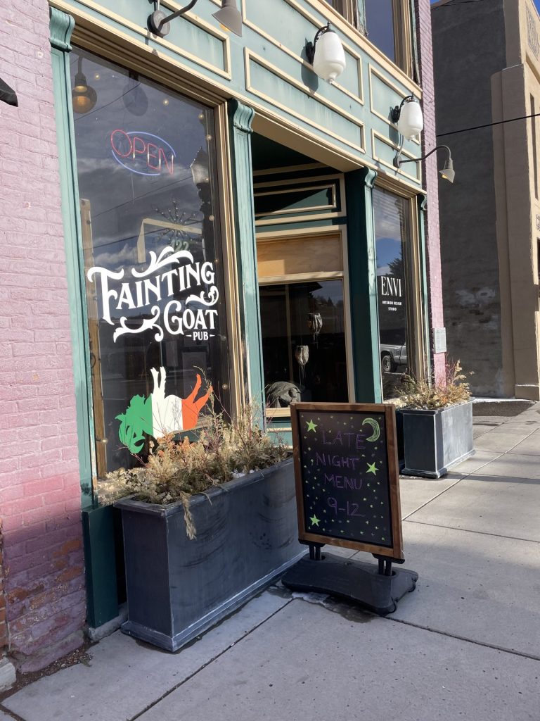 front façade with signage for fainting goat pub