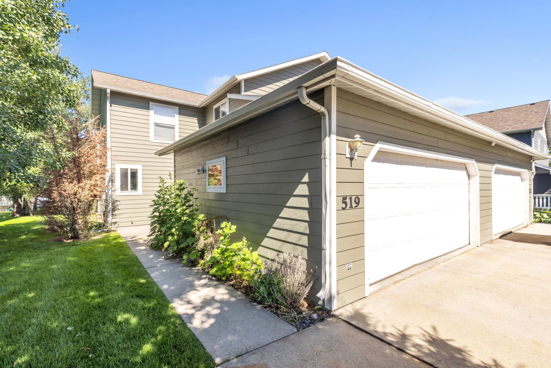 519 N 19th Avenue, Unit C, front of garage and side of building looking towards entry walkway