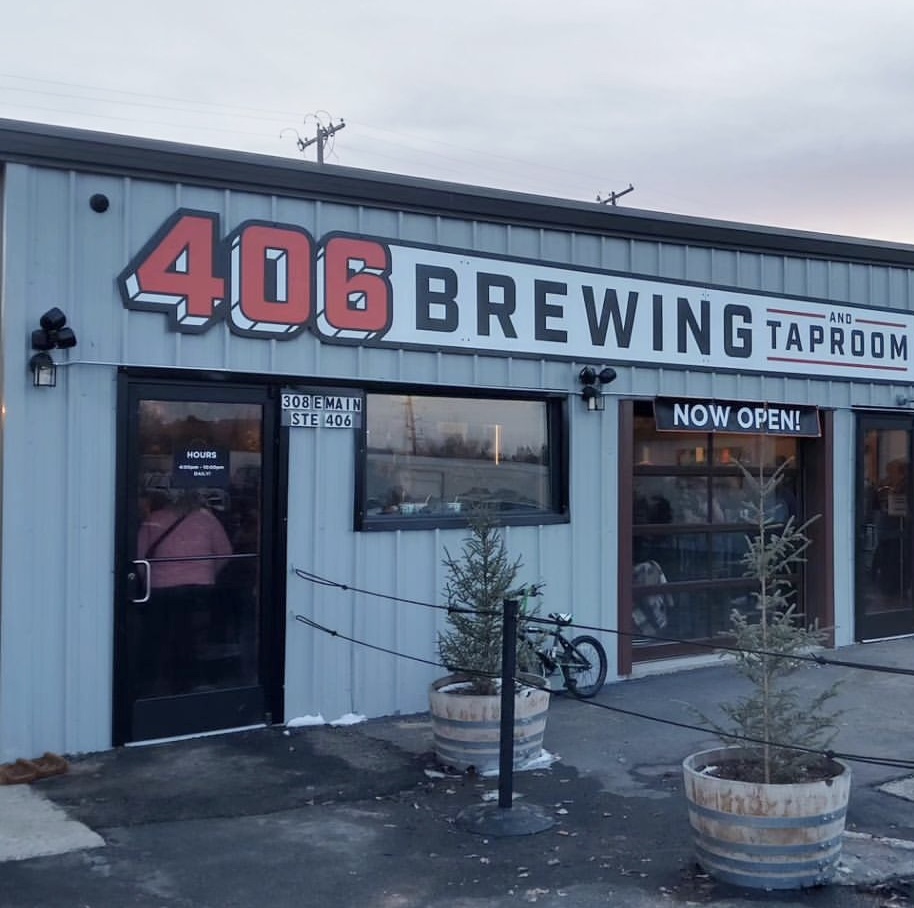 Exterior of 406 brewing & taproom with signage