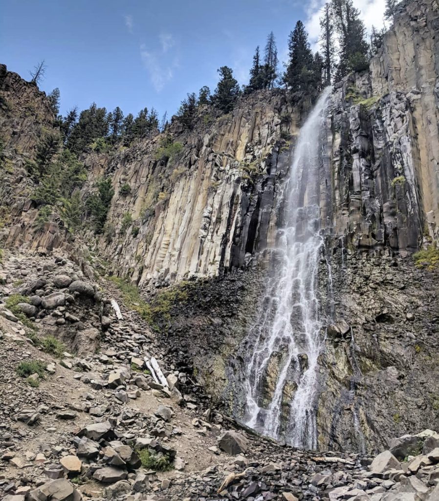 view of palisade falls from the bottom where the trail and viewing area are